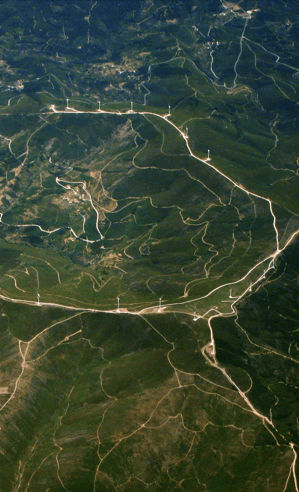 Aerial map view of wind turbine cluster